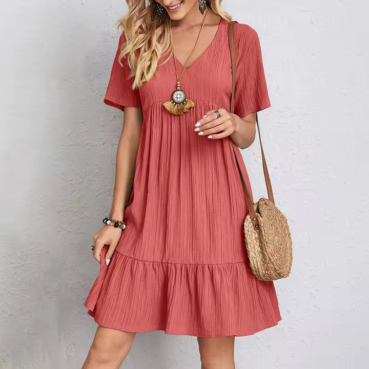 Schlichtes Kleid mit femininer Form