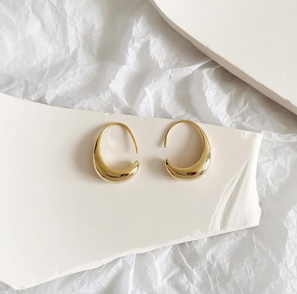 Luxuriöse Ohrringe aus Gold und Silber