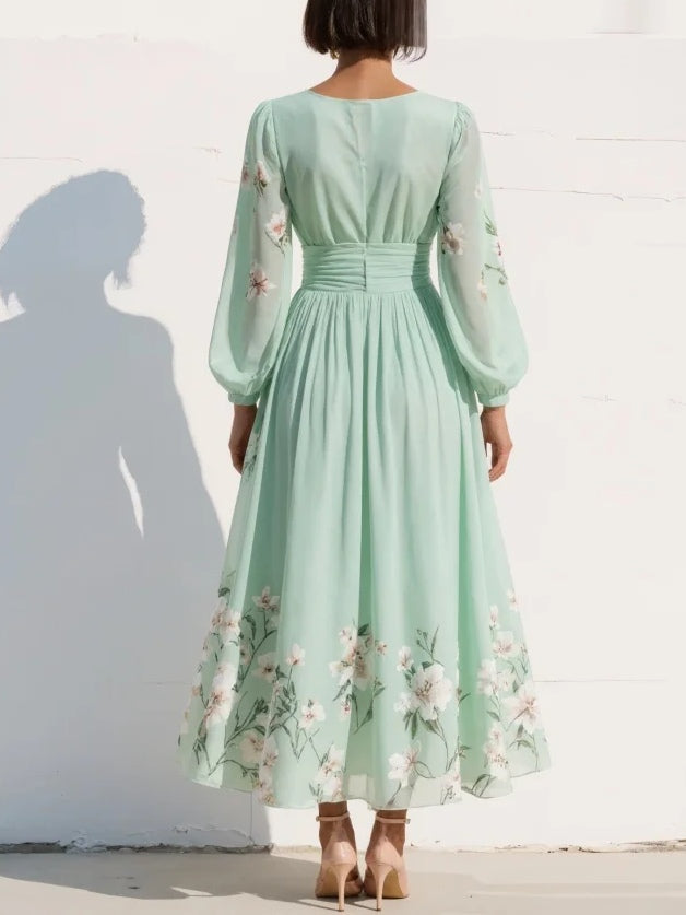 VENIRA | Midi Kleid mit floralem Muster in Grün